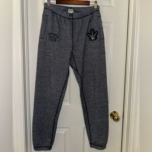 roots x toronto maple leafs | men’s navy blue track pants in size small
